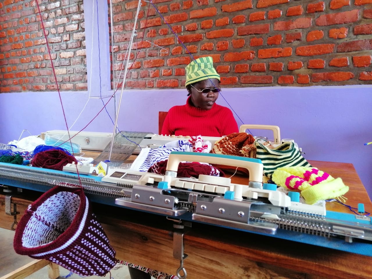 Rwanda Action: Godberita-leads-the-knitting-group-even-though-she-is-blind